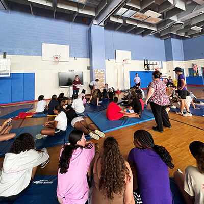 Teens at workshop in gym