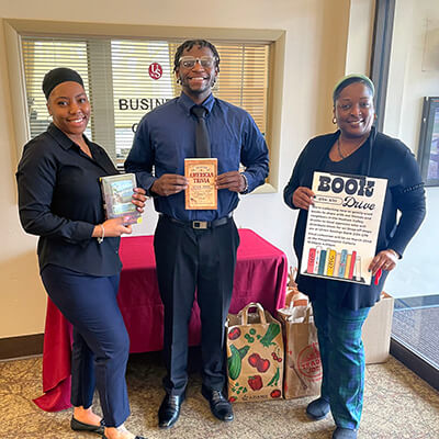 USB employees with books