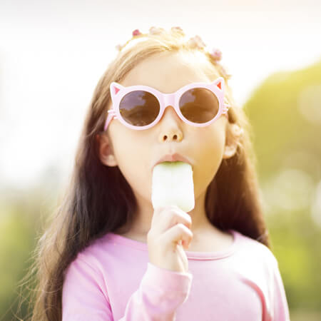 Girl eating ice cream.