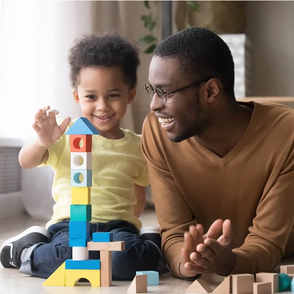 Father and Son Building with Blocks