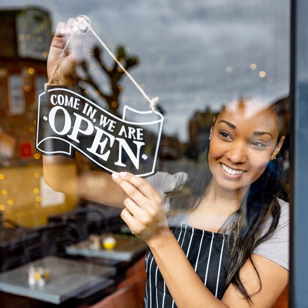 Woman with Open Sign