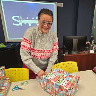 Volunteers wrapping presents